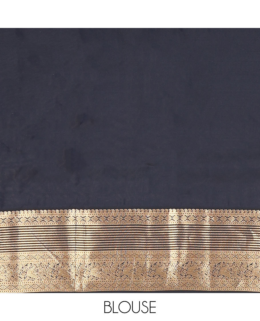 Yellow Vasundhara Lite-Silk Mix Saree Decked Up with Zari Buttas, Complemented by a Contrast Black Border Depicting Manga, Muthu, Kamalam, Banaras, Diamond, and Mayil Designs, Pallu Steeped with Diagonal Leaf Vines, and a Contrast Blouse