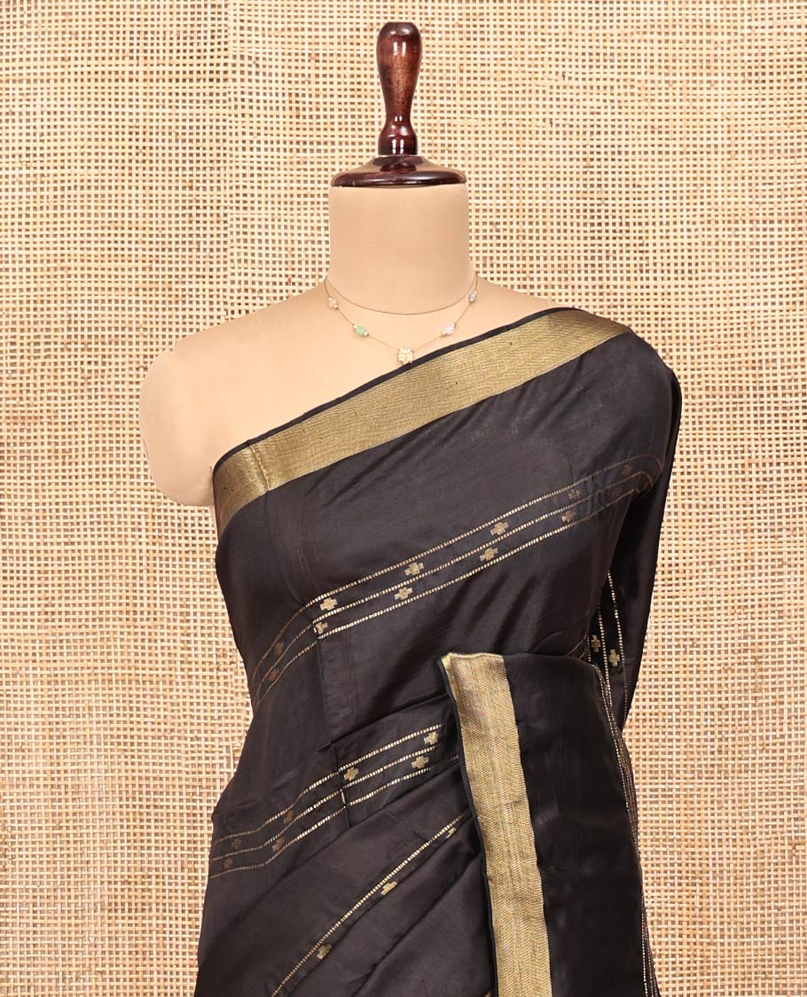 Black Banana Pith Saree, Enthralled with Buttas and Stripes on Its Body, Subtly Zari Border, Pallu Steeped with Zari Stripes, and Paired with a Matching Blouse