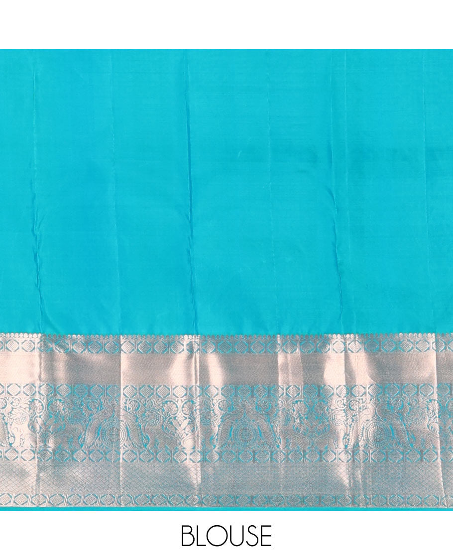 Blue jacquard wedding silksaree,zari border of thilakam mokku,laddu kamalam,singam,mayil chakram & jaal design & intricate pallu