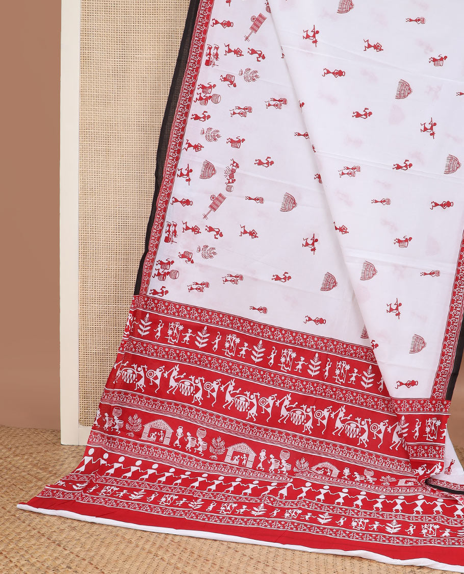 White warli village-theme printed mul mul cotton saree, contrast warli printed red border & pallu of warli motifs print