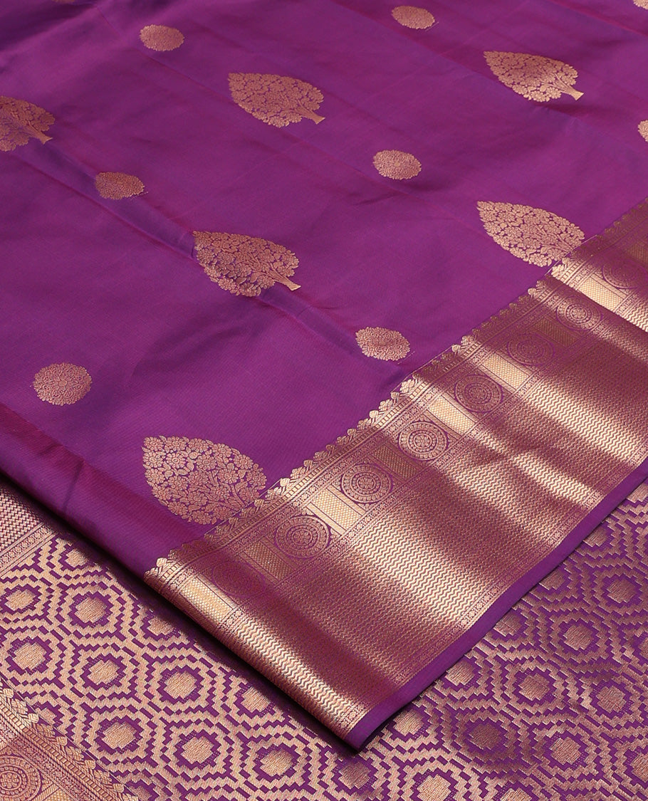 Purple zari buttas Vasundhara silk mix, zari border of chakram and vanki designs, and geometric patterned pallu