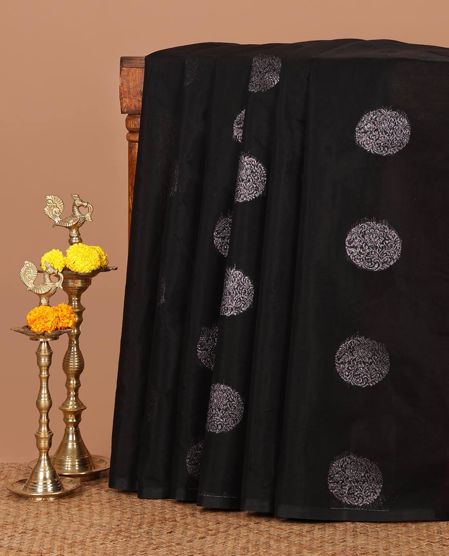 Borderless black silk cotton saree with circular-shaped zari buttas, contrast pallu of floral creeper & jaal design