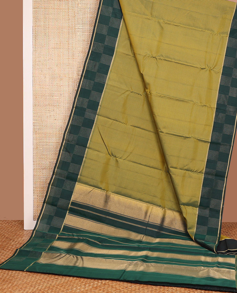 Green zari striped Vasundhara silk mix, contrast zari border and zari design pallu
