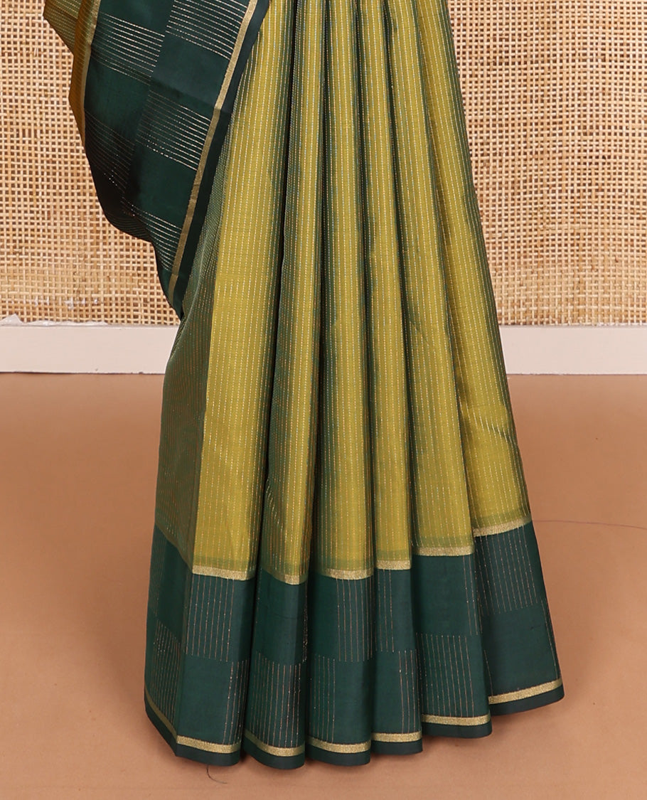 Green zari striped Vasundhara silk mix, contrast zari border and zari design pallu