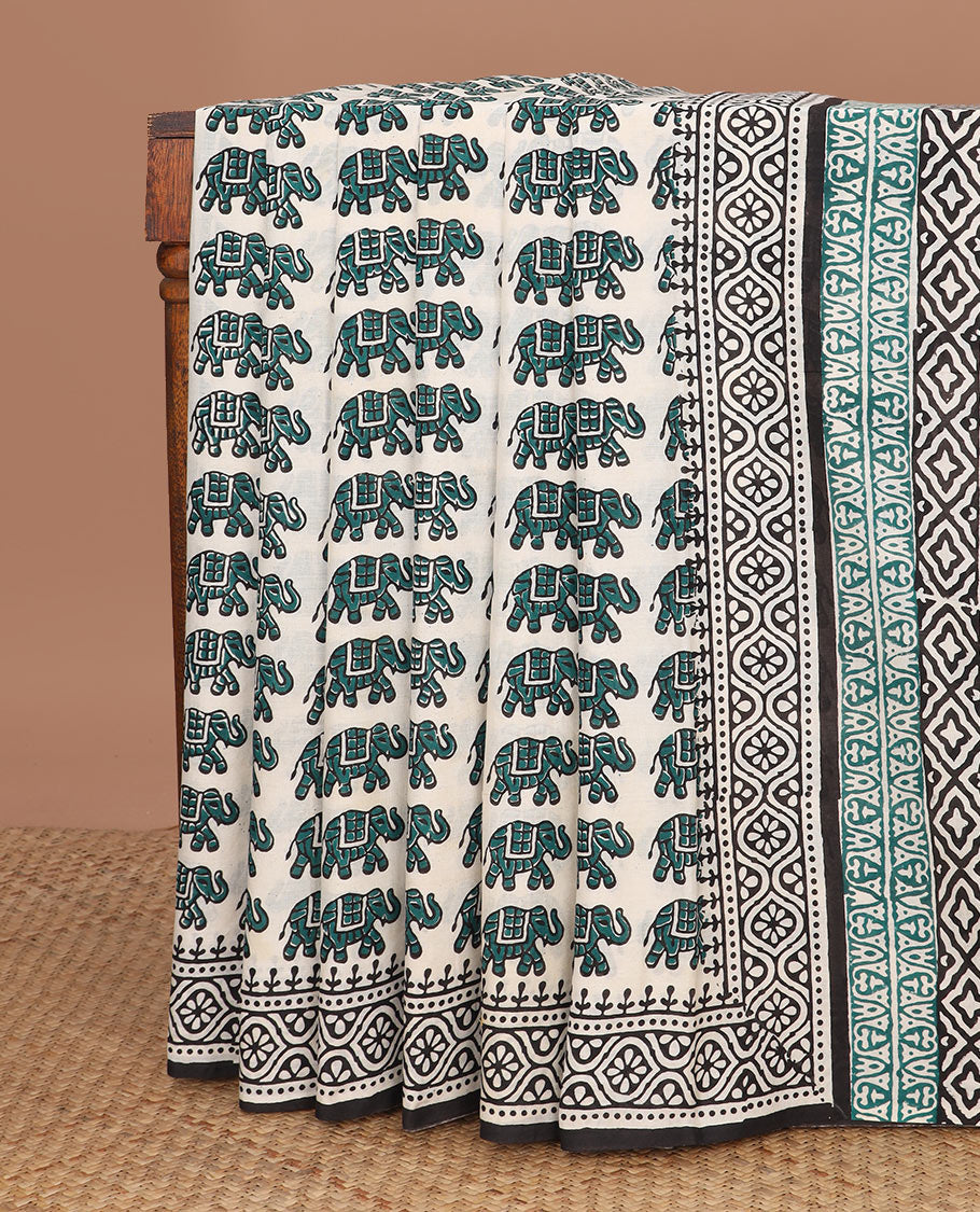 Cream elephant motifs printed mul mul cotton saree, geometric block printed border & pallu of floral-geometric block print