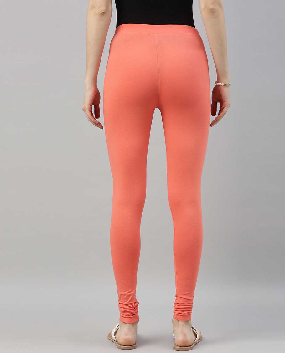 Pastel orange plain design twin birds legging
