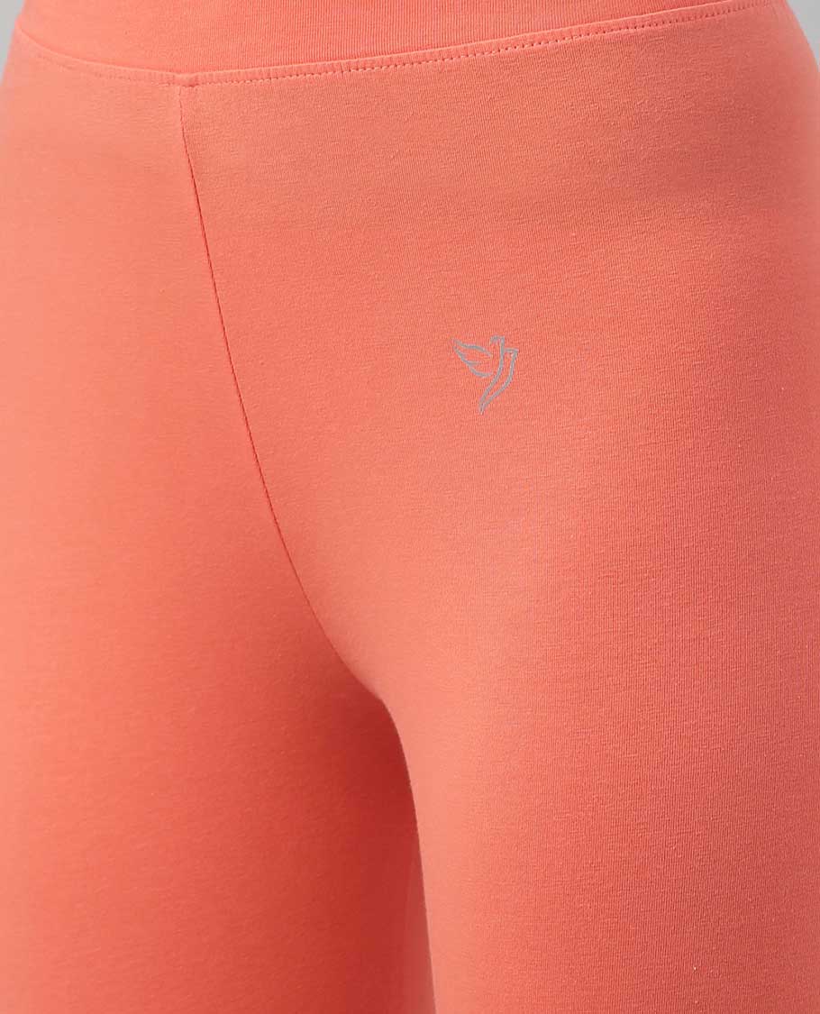 Pastel orange plain design twin birds legging