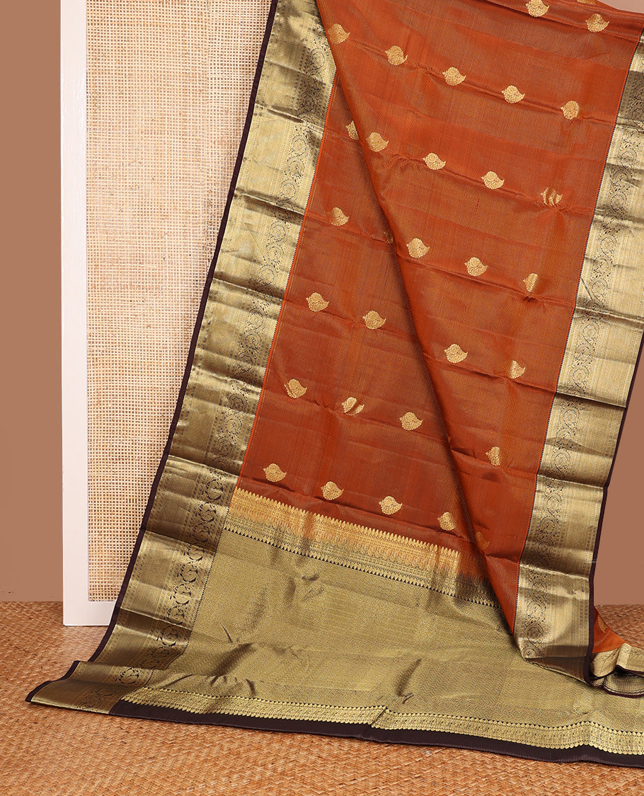 Orange zari design Vasundhara silk mix, contrast border of rekku, kamalam, kodi mayil, and jaal designs, and geometric pallu