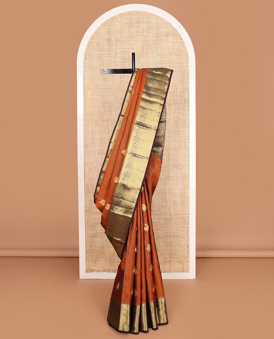 Orange zari design Vasundhara silk mix, contrast border of rekku, kamalam, kodi mayil, and jaal designs, and geometric pallu