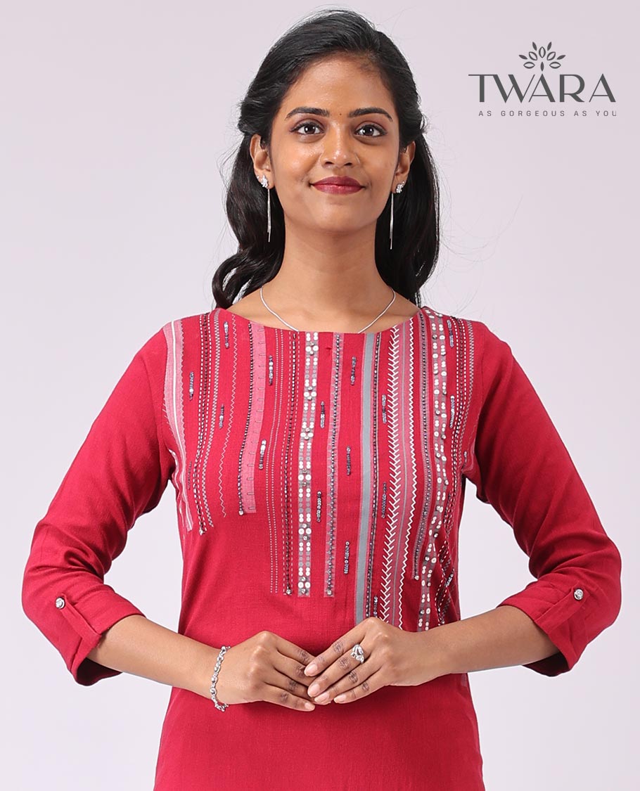 Twara red intricate embroidered round neck , 3/4 th sleeve , below knee leght straight cut kurti