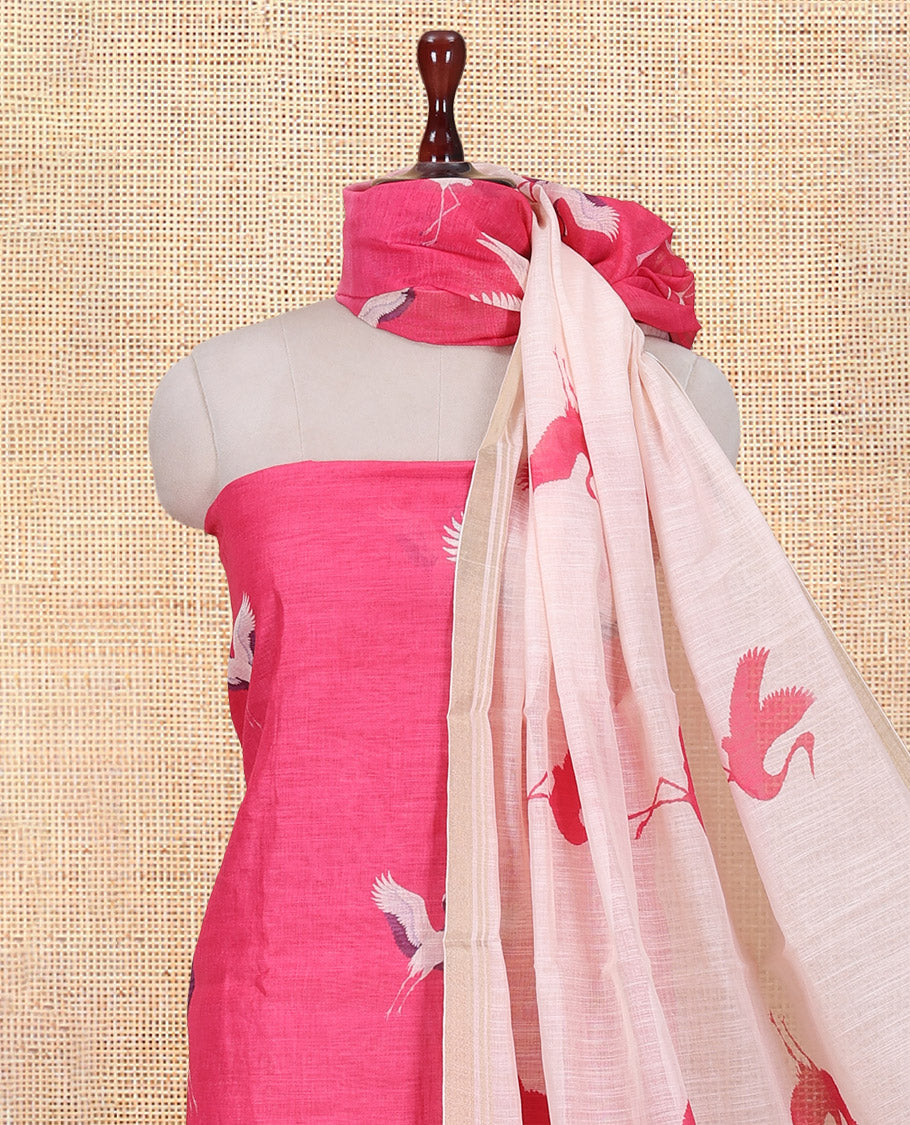 Pink Semi-Linen Material Churidar, Adorned with Heron Motifs Top, a Plain Santoon Bottom, a Contrast Heron Dupatta