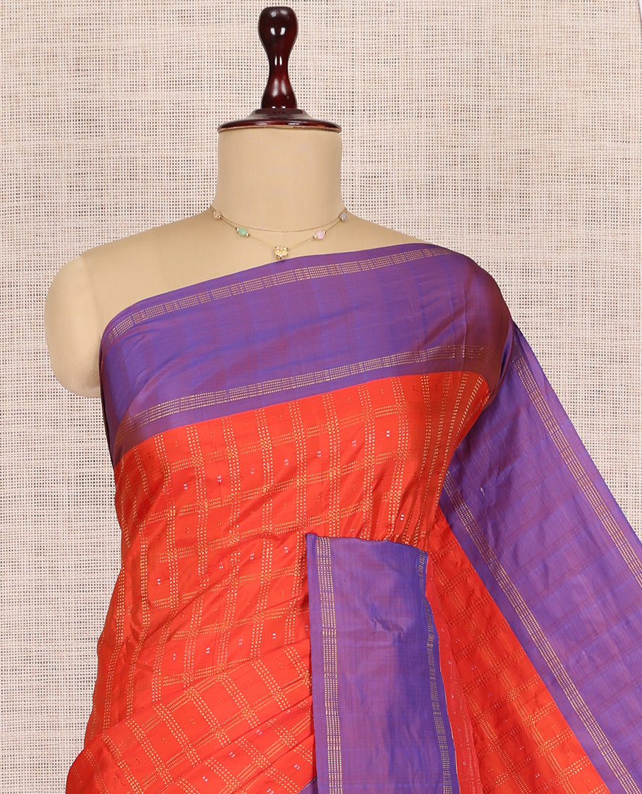 Orange Arani Saree, Detailed with Zari Butta Enclosed Checks, a Contrast Bodi Border, Pallu of Zari Design, and a Matching Blouse