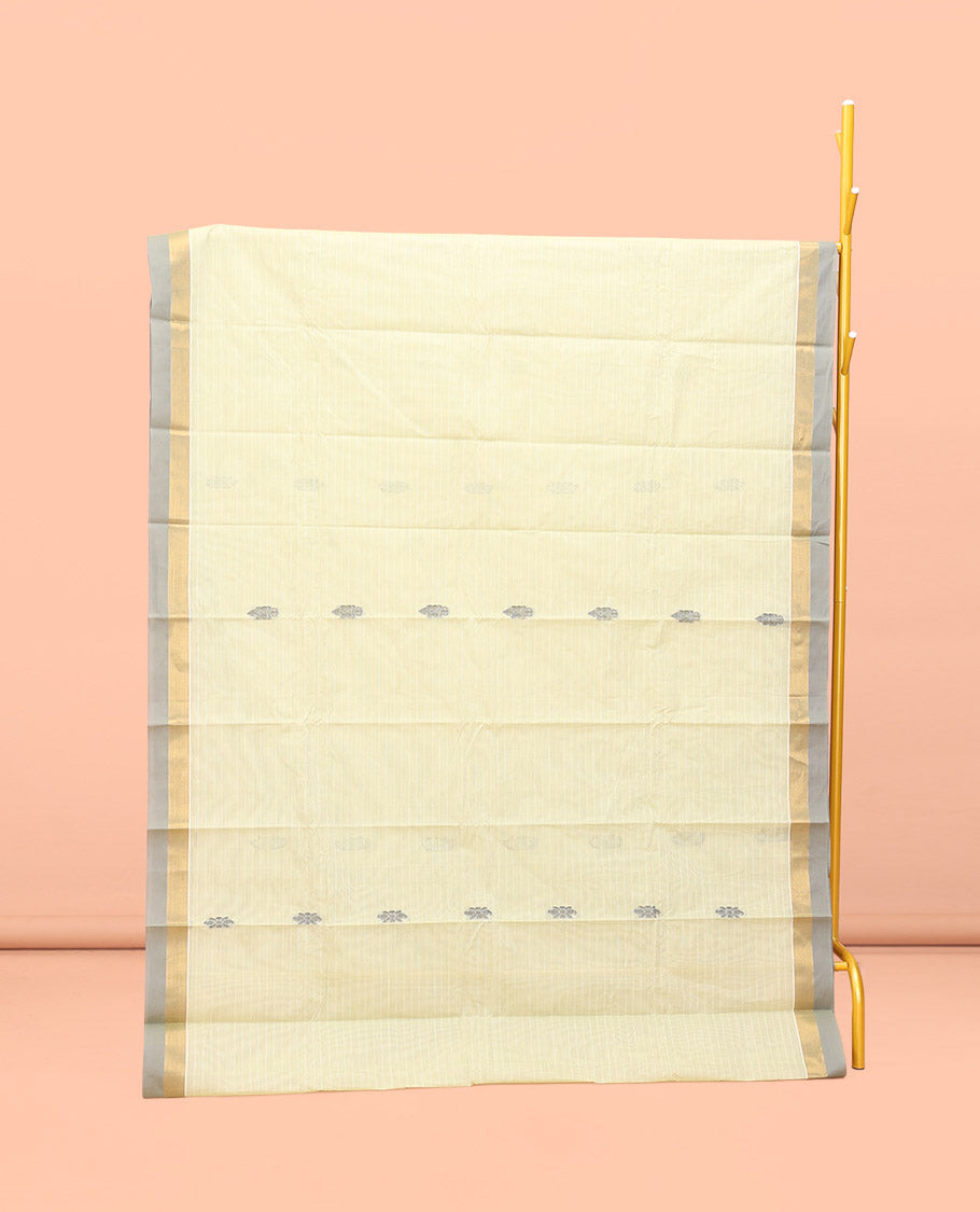 Pale Yellow Kanchi Cotton Saree, Woven with Buttas All Over Its Body, a Complemented by Contrast Border, Pallu of Intricate Designs, and Paired with a Matching Blouse