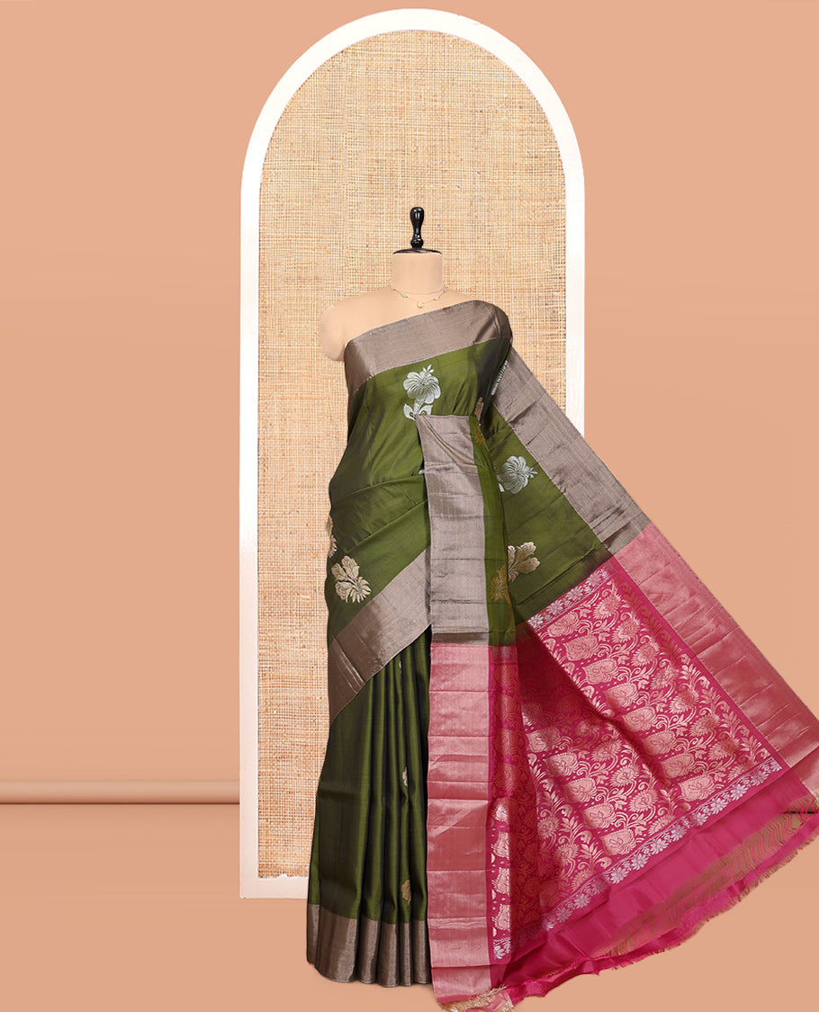 Dark Green Semi Uppada Saree, Decked up with Hibiscus Floral Buttas, a Bavanji Border, Contrast Intricate Pallu, and a Contrast Blouse