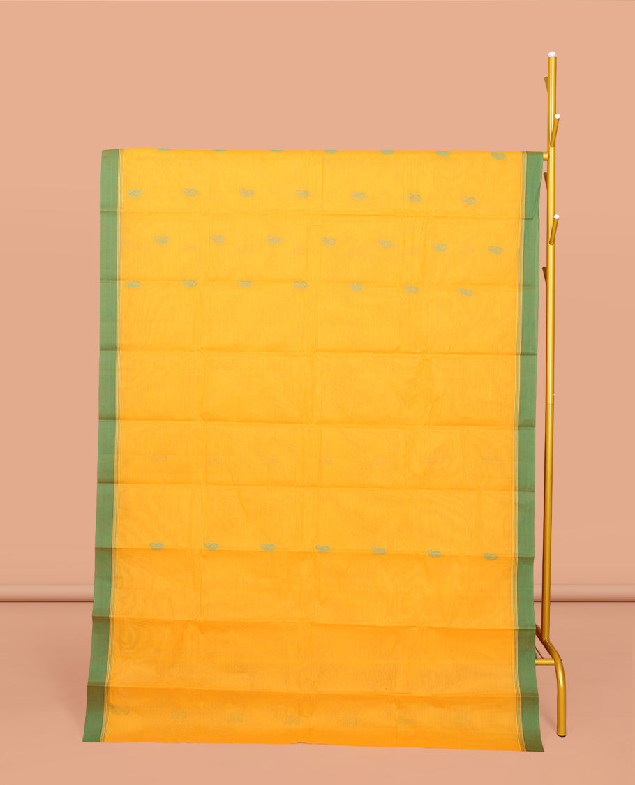 Yellow Kanchi Cotton Saree, Decked Up with Buttas All Over Its Body, Complemented by a Contrast Border, Pallu of Intricate Design, and Paired with a Matching Blouse