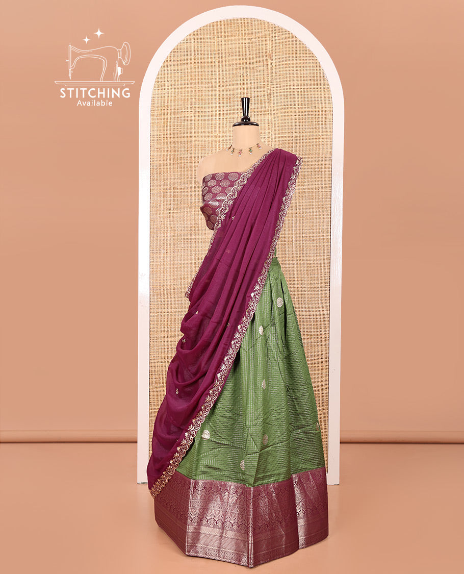 Mehendi Green and Purple Banarasi Silk Half-Saree Featuring Micro-Checks and Chakram Buttas Woven Skirt, Complemented by Contrast Traditional Zari Design Border, Paired with a Jacquard Blouse, and a Rangoli Georgette Embroidered Dhavani