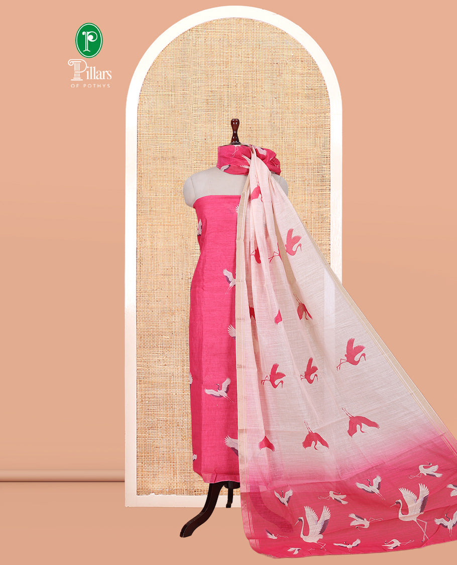 Pink Semi-Linen Material Churidar, Adorned with Heron Motifs Top, a Plain Santoon Bottom, a Contrast Heron Dupatta