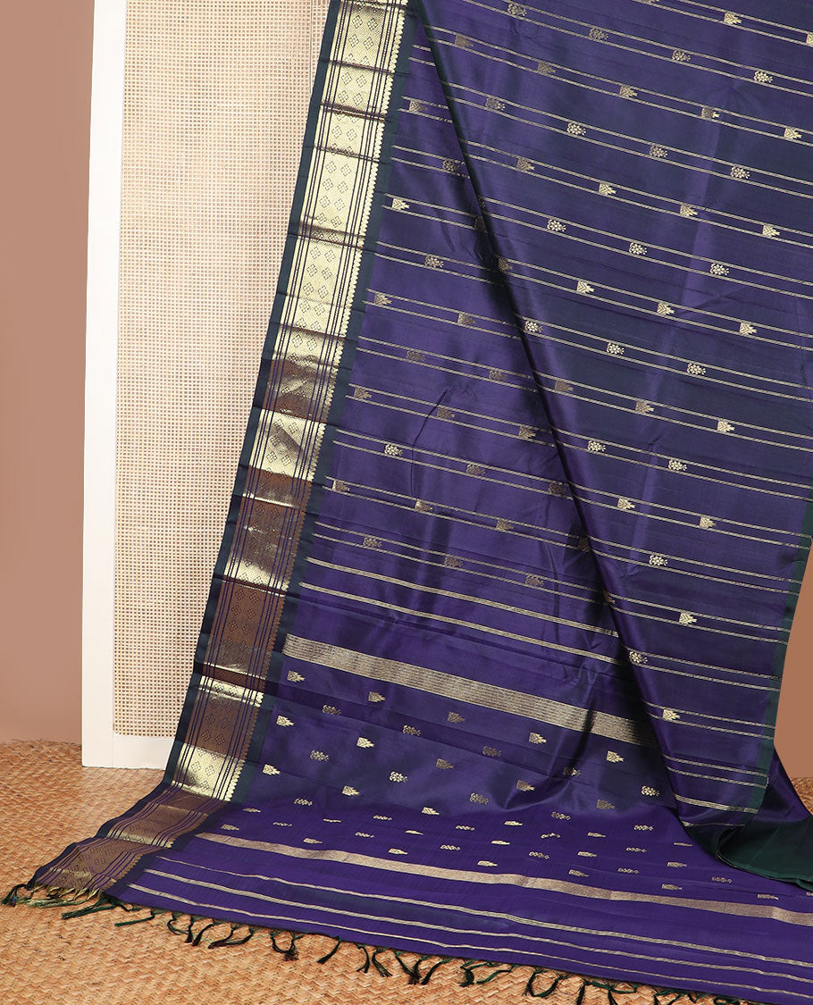 Blue thazampoo rekku buttas Kanchipuram silk saree, contrast one-sided border of thilakam mokku,muthu,banaras & jaal & zari design pallu