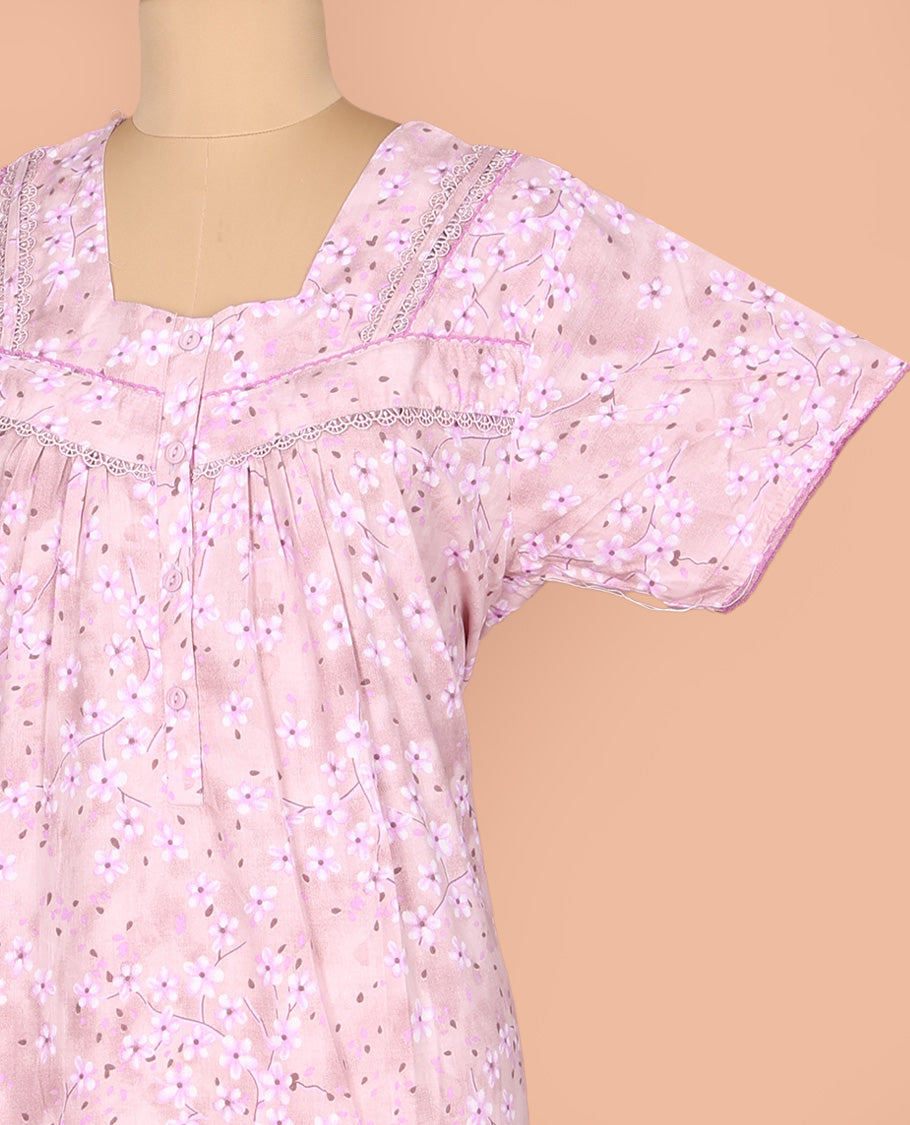Pale Pink Cotton Nighty Subtly Sparkled with Floral Print, Featuring Lace Work, Square Front Neck, and Half Sleeves