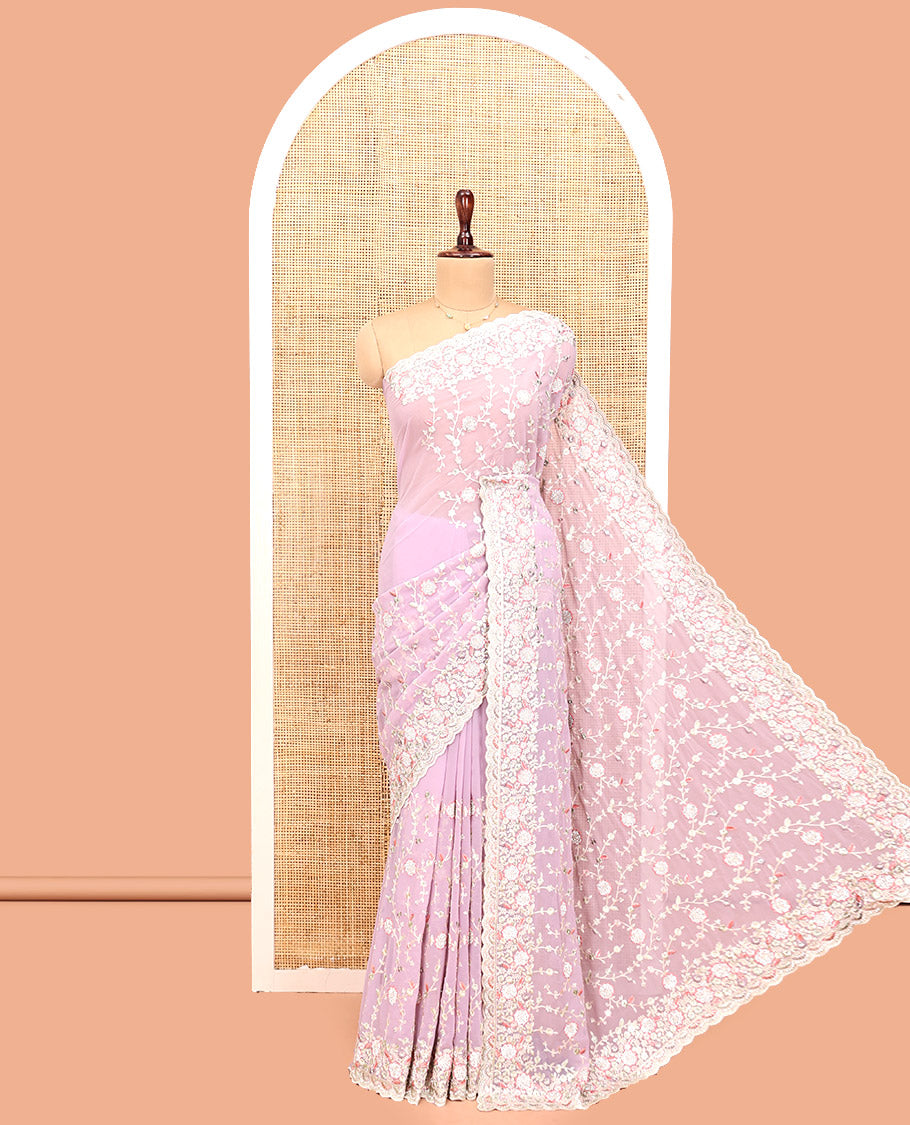 Pale Pink Designer Saree, Beautifully Bedecked with Floral Vine Embroidery, a Scallop Embroidered Border, and a Matching Blouse