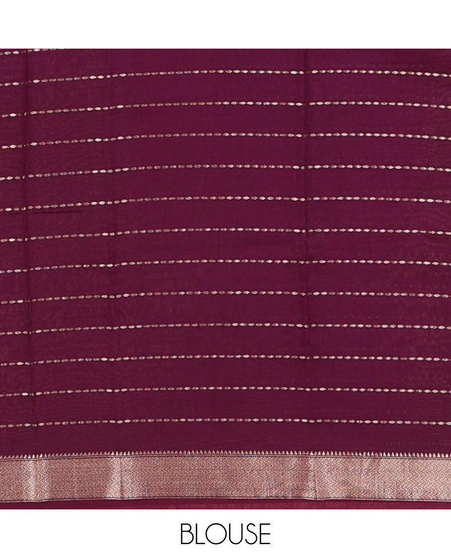 Orange Assam Silk Saree, Gleamed Up with Zari Stripes on Its Body, Highlighted by Zari Border, Pallu Steeped with Zari Stripes, and Paired with a Contrast Blouse