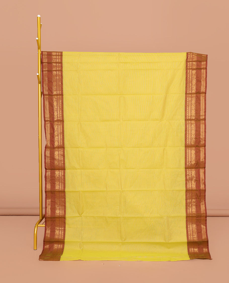 Yellow Plain Chettinad Cotton Saree, Complemented by a Contrast Traditional Zari Design Rettai Pettu Border, Pallu of Stripes, and Paired with a Matching Blouse