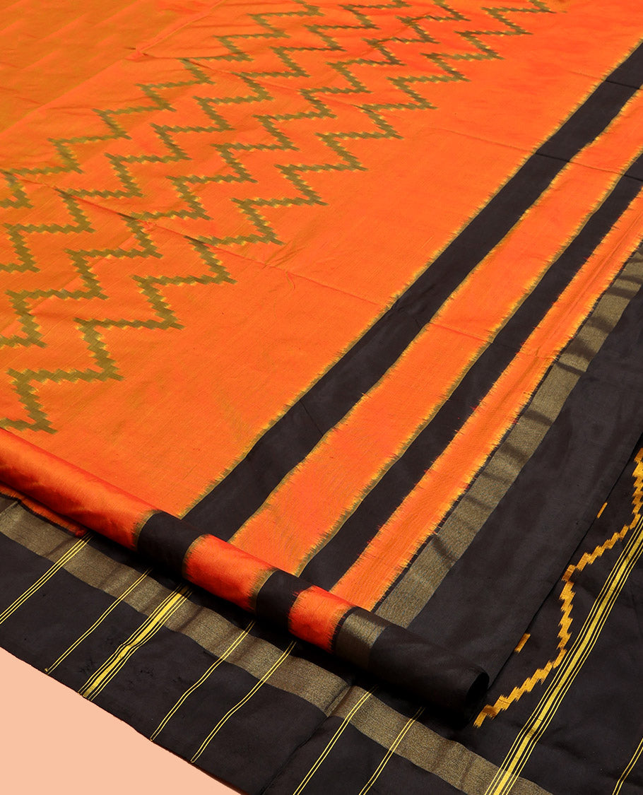 Orange Pochampally Ikat Silk Saree, Decked Up with Chevron Stripes, Complemented by a Contrast Border, Chevron Striped Pallu, and a Contrast Blouse