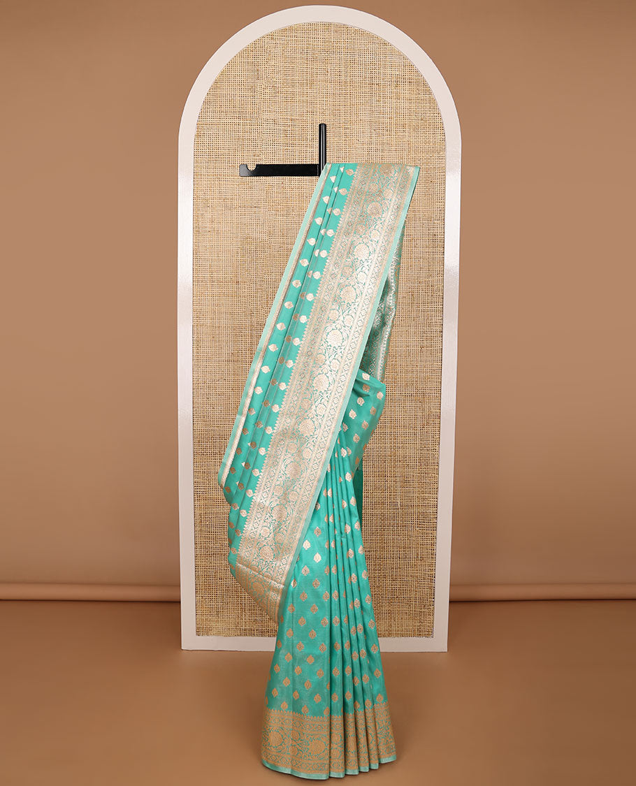 Sea green leaf buttas semi banaras nylon saree with self traditional zari design border & floral vine design pallu