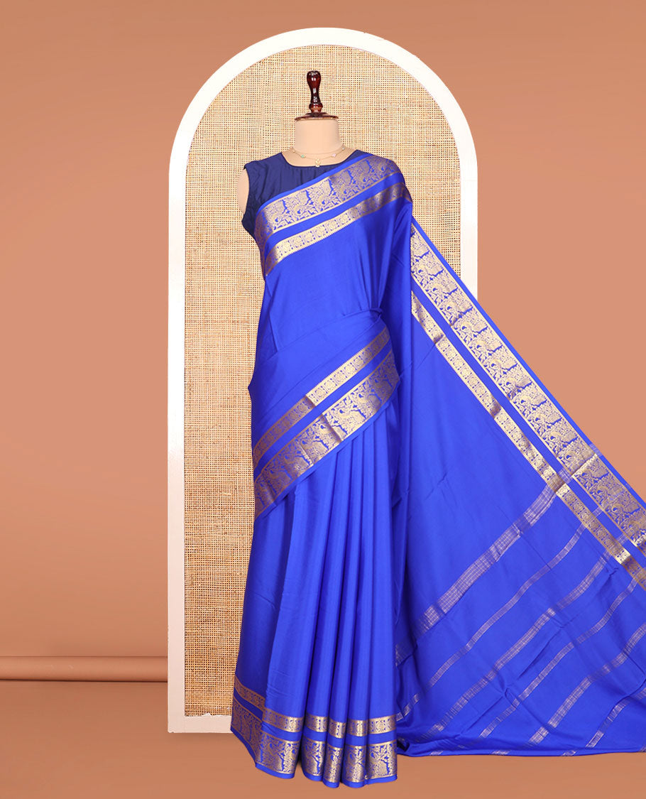 Blue Plain Mysore Silk Saree, Richly Detailed with Zari Border of Peacock Designs, Sparsely Woven Pallu of Stripes, and Paired with a Matching Blouse