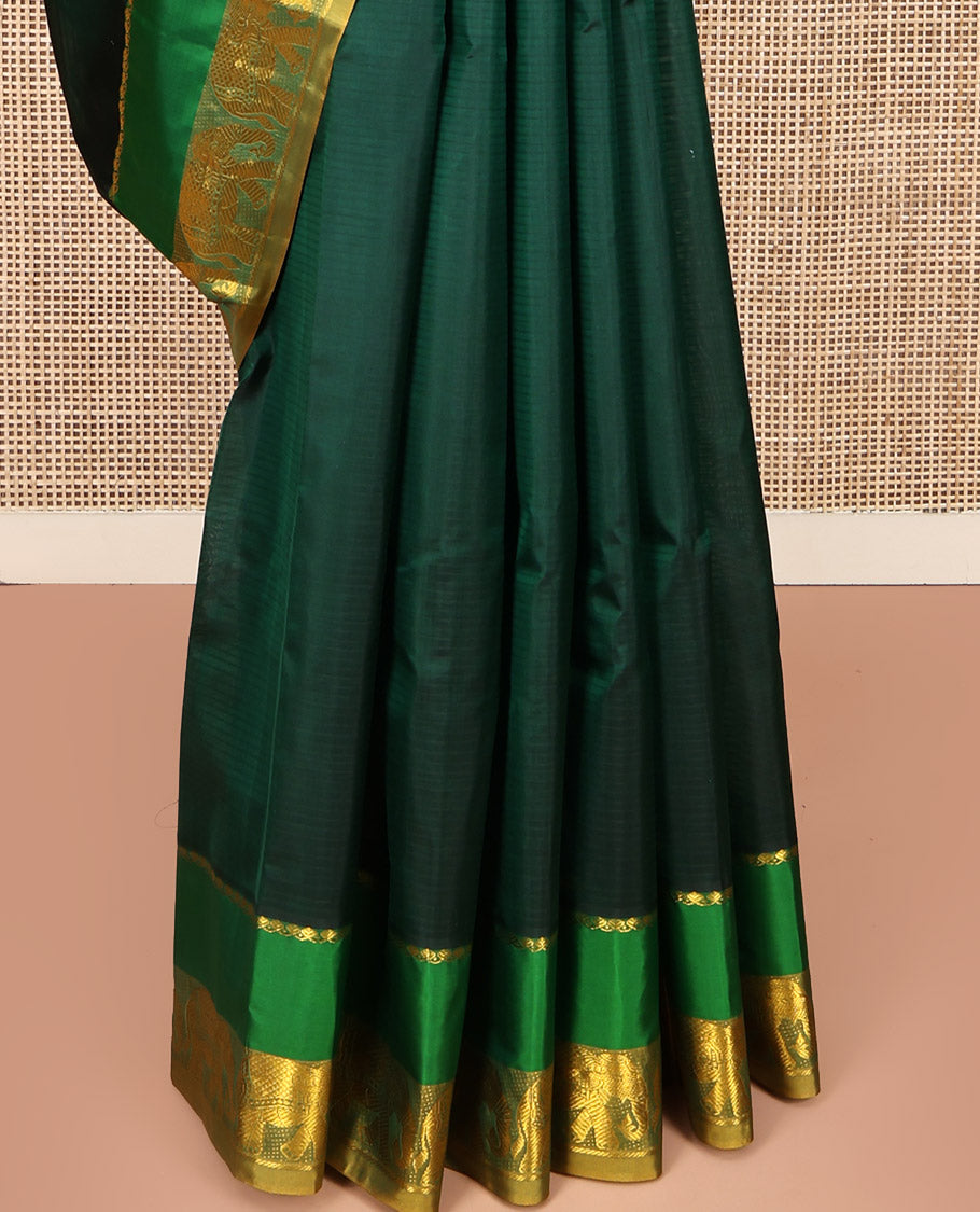Green Kanchipuram Silk Saree, Sparsely Woven with Vazhaipoo Stripes on Its Body, Complemented by Contrast Rettai Pettu Border of Salngai, and Yaanai Designs, Zari-Striped Pallu, and Paired with a Contrast Blouse
