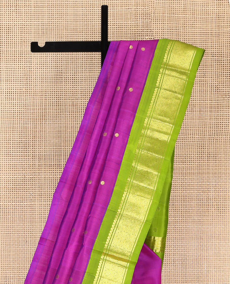 Rani Pink Kanchipuram Silk Saree, Woven with Zari Buttas on Its Body, Complemented by a Contrast One-Sided Korvai Border of Salngai, Banaras, and Jaal Designs, Pallu of Zari Designs, and Comes Without a Blouse