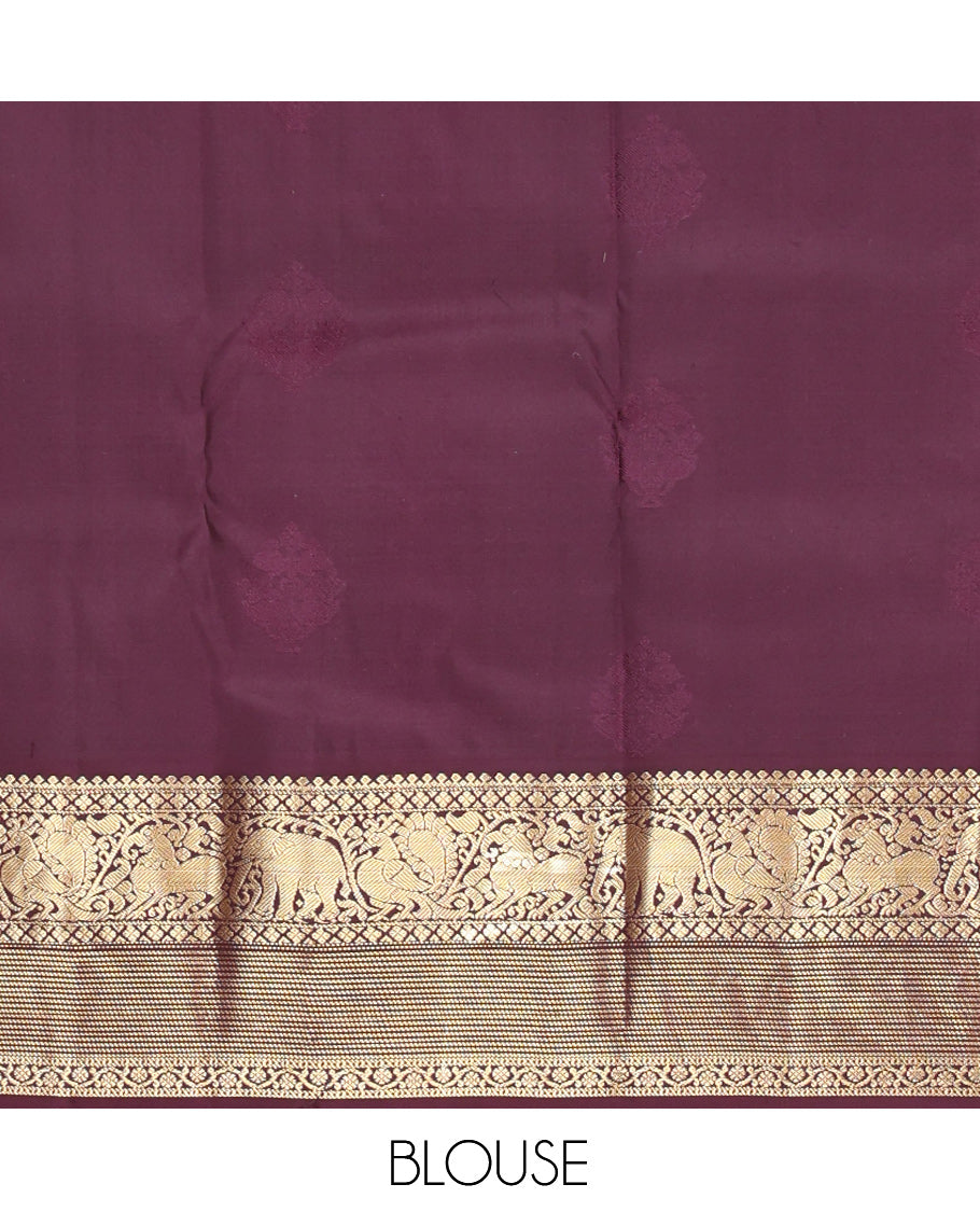 Yellow Vasundhara Silk Saree, Richly Detailed with Zari Buttas, Contrast Border of Thilakam Mokku, Mayil Kann, Yaali, Yaanai, Mayil, and Kodi Visiry, Grand Pallu, and a Contrast Blouse