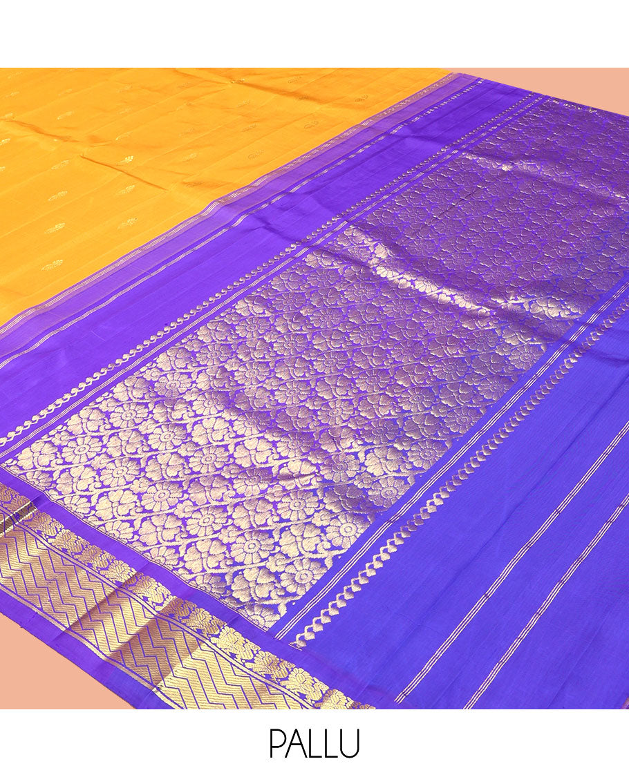 Yellow Kanchipuram Silk Saree, Subtly Sparkled with Zari Buttas, a Contrast One-Sided Korvai Border of Mayil Designs, a Floral Design Pallu, and No Blouse