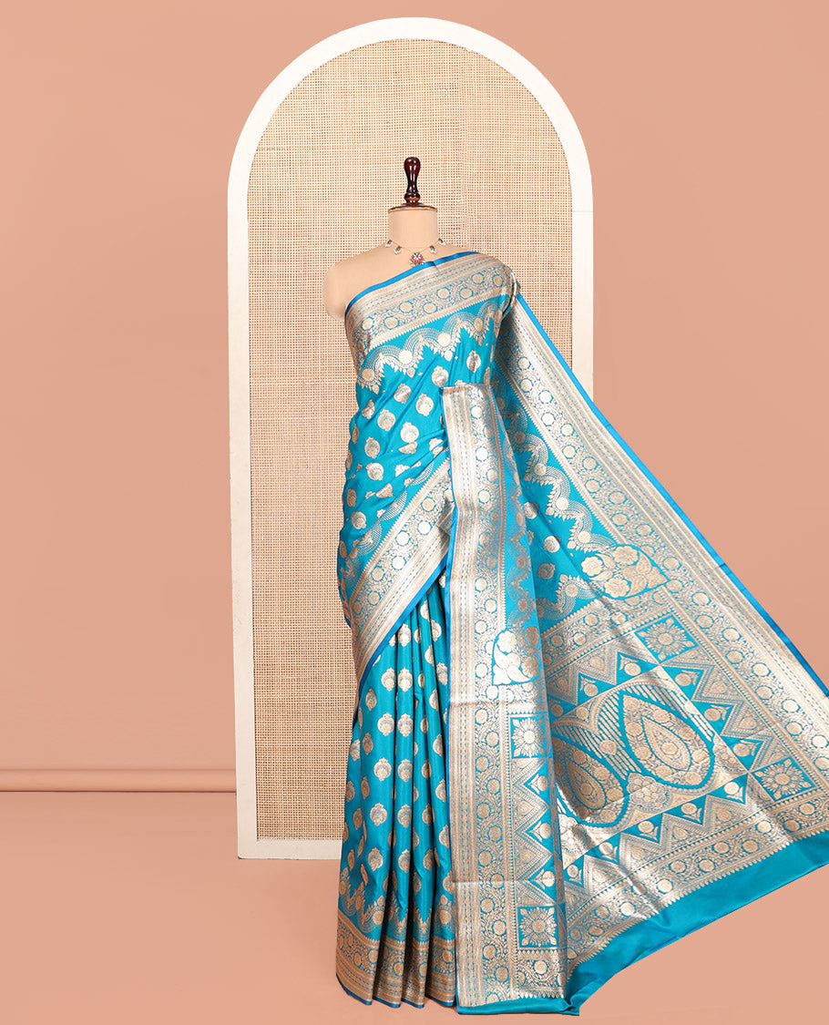 Blue Banarasi Nylon Saree, Impeccably Styled with Zari Buttas, Highlighted by a Traditional Zari Border, Intricate Pallu, and a Matching Blouse