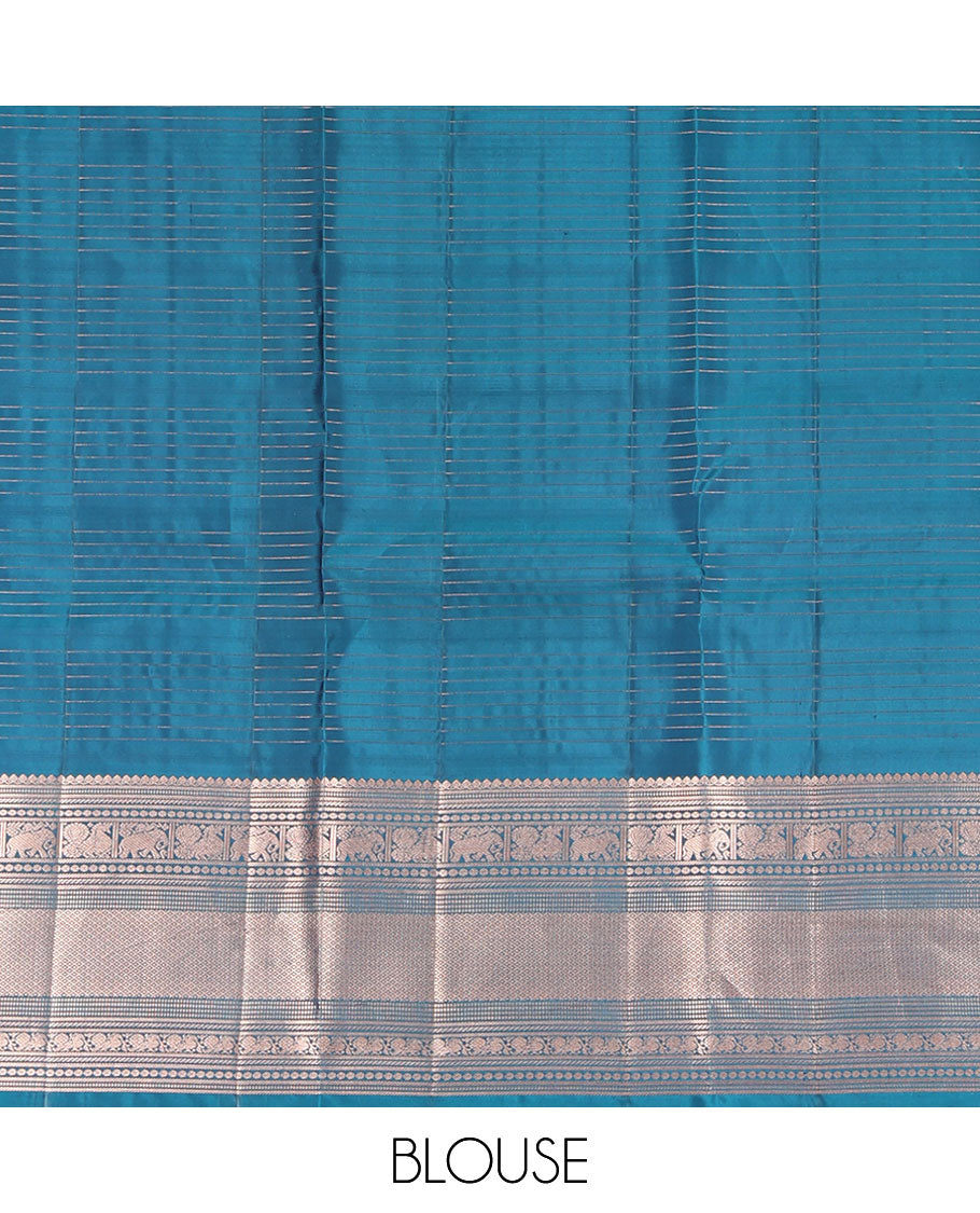 Blue Vasundhara Silk Saree, Enriched with Zari Butta Enclosed Checked Design All Over Its Body, Highlighted by Zari Border of Thilakam Mokku, Muthu, Mayil, Yaanai, and Mayil Kann Designs, Grand Jaal Pallu, and Paired with a Matching Blouse