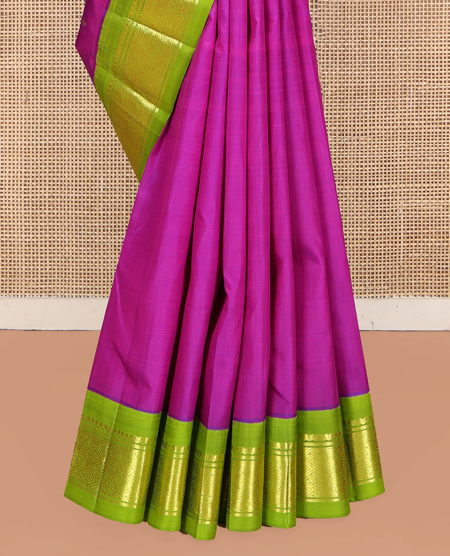 Rani Pink Kanchipuram Silk Saree, Woven with Zari Buttas on Its Body, Complemented by a Contrast One-Sided Korvai Border of Salngai, Banaras, and Jaal Designs, Pallu of Zari Designs, and Comes Without a Blouse