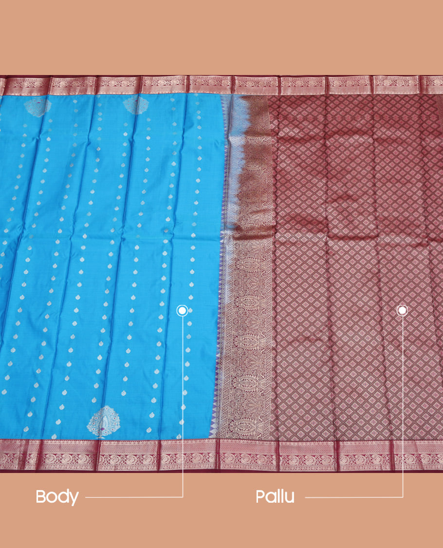 Blue Budget Silk Saree, Mesmerized with Zari Buttas All Over Its Body, Complemented by Contrast Traditional Zari Designs Woven Rettai Pettu Border, Grand Jaal Pallu and Paired with a Contrast Blouse