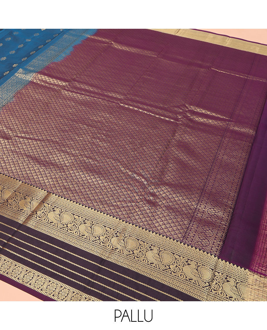 Blue Vasundhara Lite Silk Mix Saree, Mesmerized with Zari Buttas on Its Body, Complemented by a Contrast Varisai Pettu Border of Rekku, Muthu, Neli, Mayil, and Cross Kamalam Designs, Beautifully Bedecked Pallu, and Paired with a Contrast Blouse