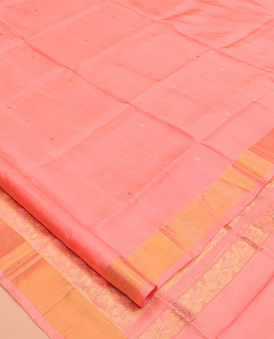 Coral Pink Uppada Silk Saree, Dazzled with Zari Buttas, a Bavanji Border, Grand Floral Jaal Pallu, and a Matching Blouse