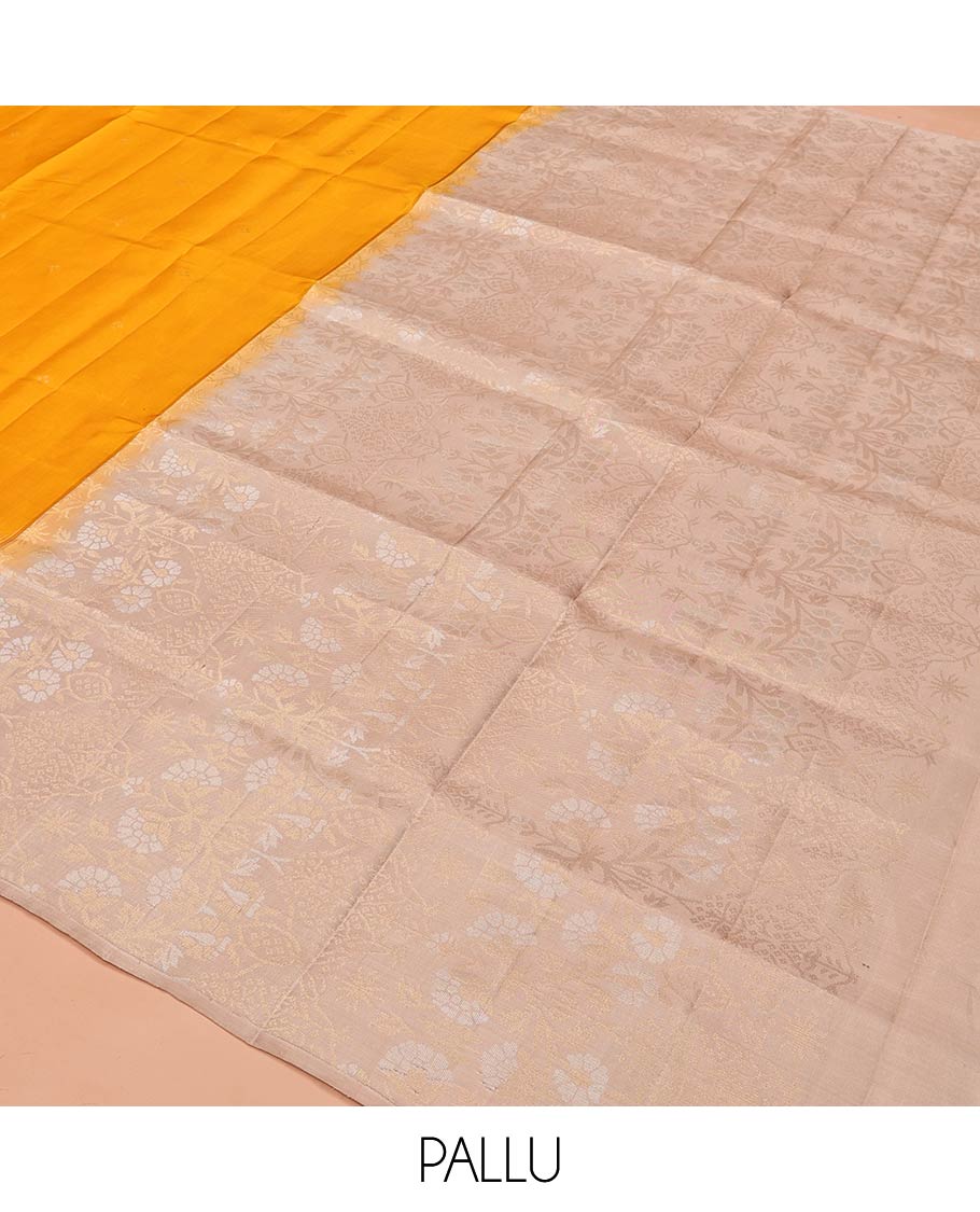 Yellow Mayuri Soft Silk Saree, Subtly Woven with Buttas All Over Its Body, Complemented by Contrast Artfully Woven Border, Pallu of Floral Designs, and Paired with a Contrast Blouse