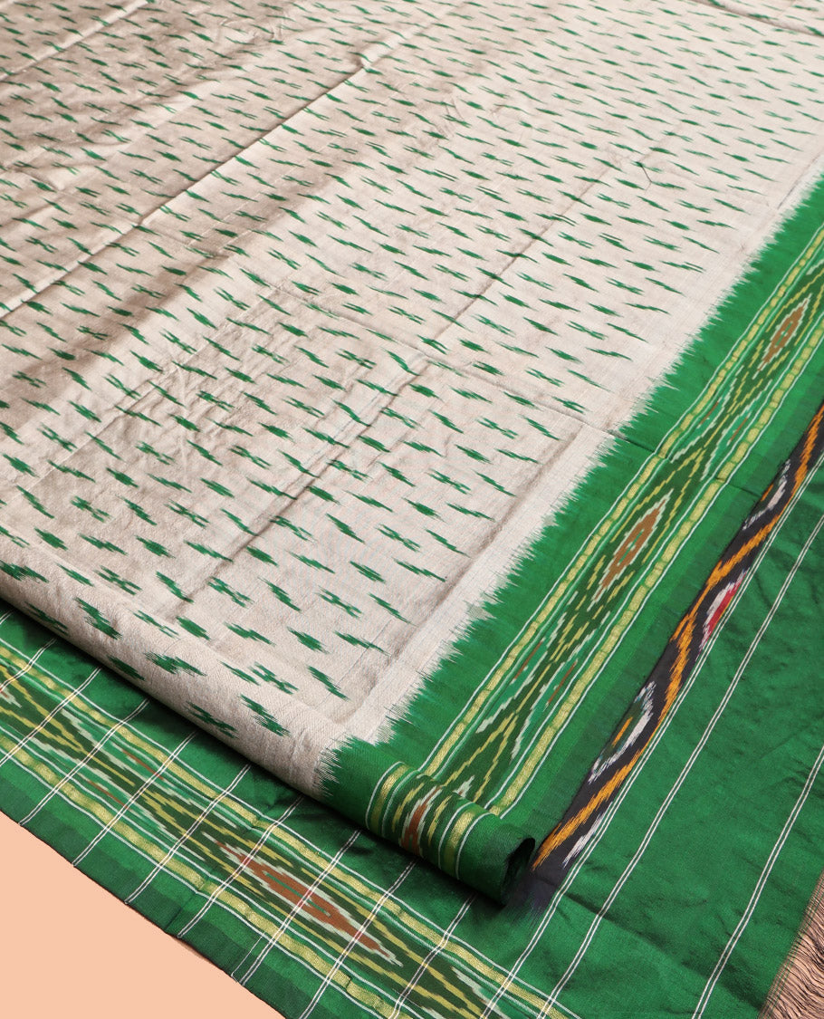 Grey-Green Pochampally Ikat Silk Saree, Adorned with Ikat Buttas, Complemented by a Contrast Ikat Border, Ikat-Style Pallu, and No Blouse