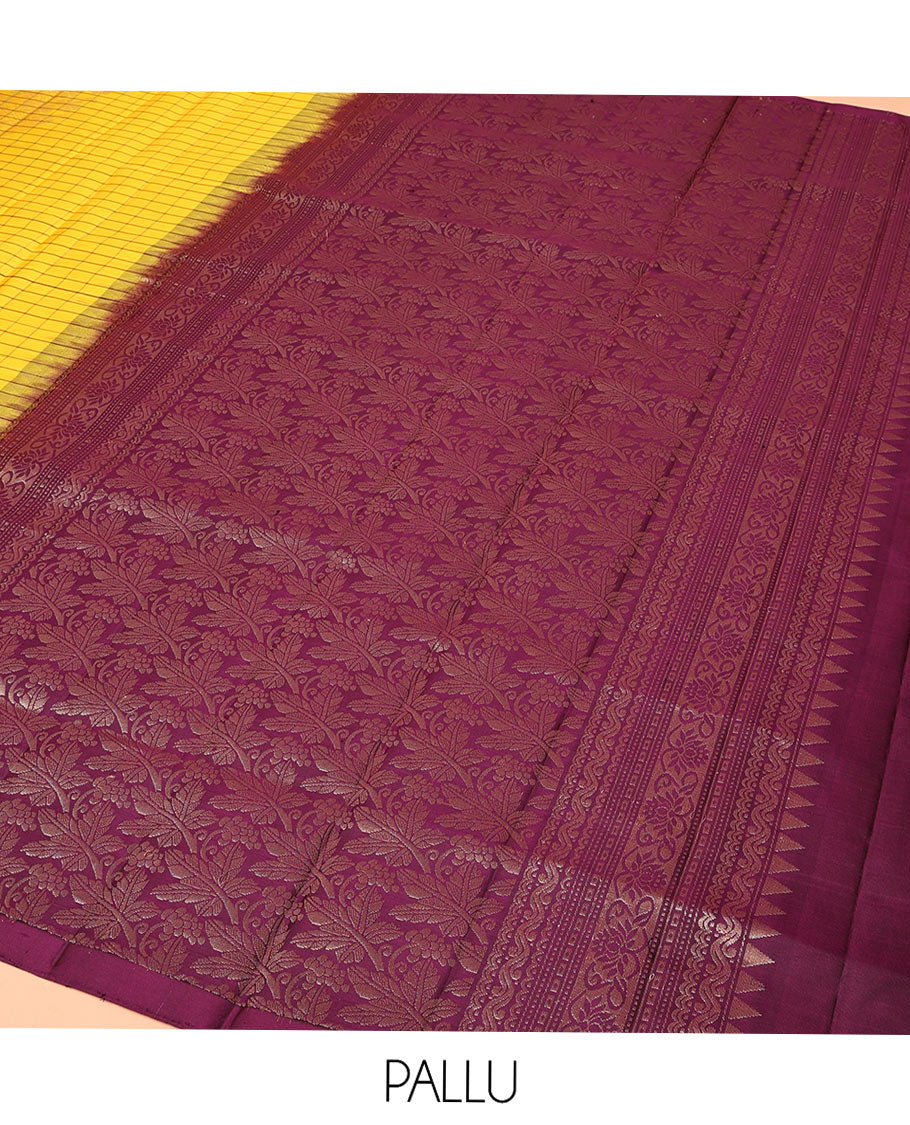 Yellow Mayuri Soft Silk Saree, Richly Detailed with Checks and Buttas All Over Its Body, Subtle Contrast Piping Border, Majestically Detailed Pallu of Leaf Designs, and Paired with a Contrast Blouse