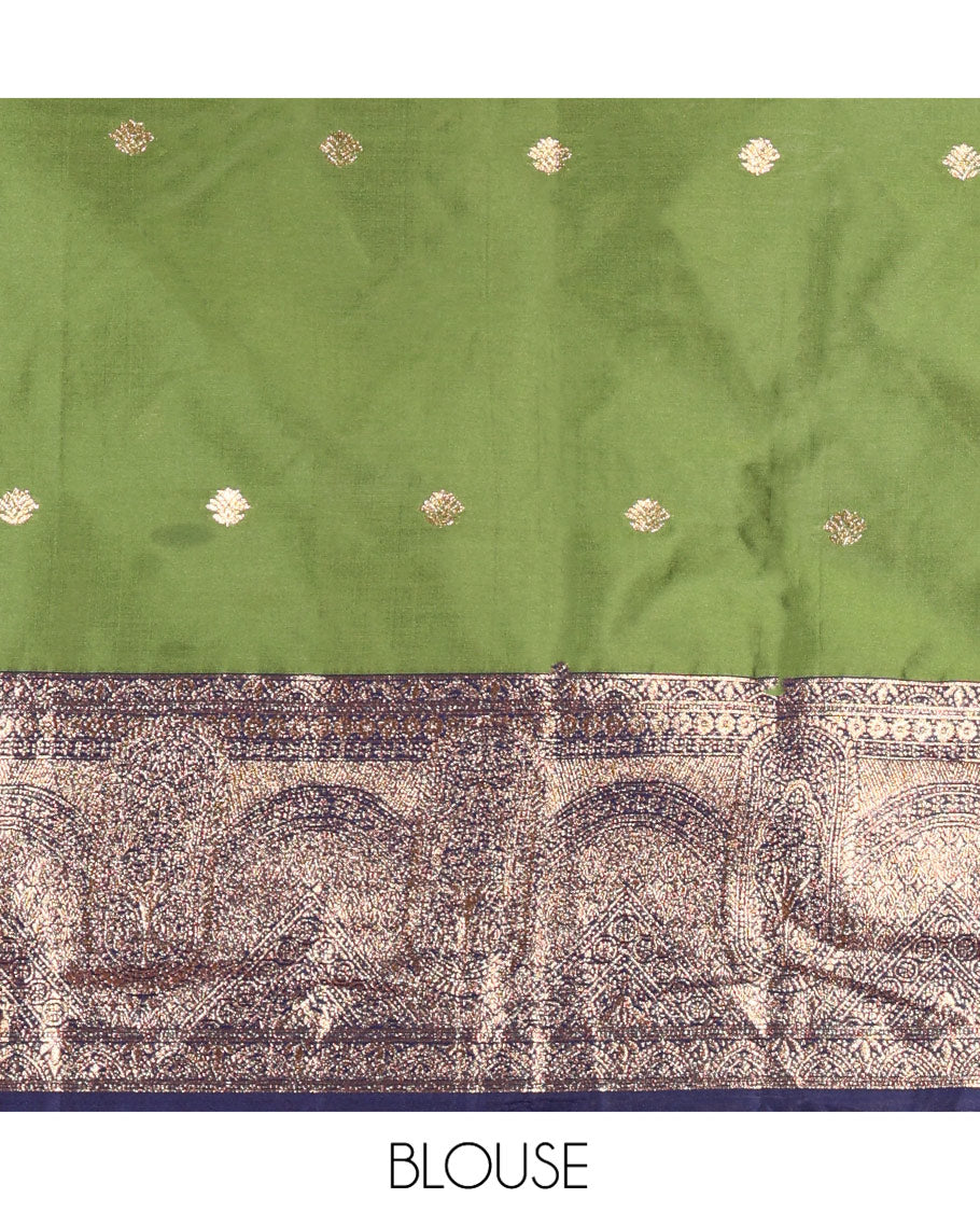 Leaf Green and Blue Semi-Banarasi Half-Saree, Beautifully Woven with Zari Buttas on Its Skirt, Complemented by a Contrast Geometric Patterns Zari Woven Border, Paired with a Matching Blouse, and a Contrast Satin Georgette Embroidered Scallop Dhavani