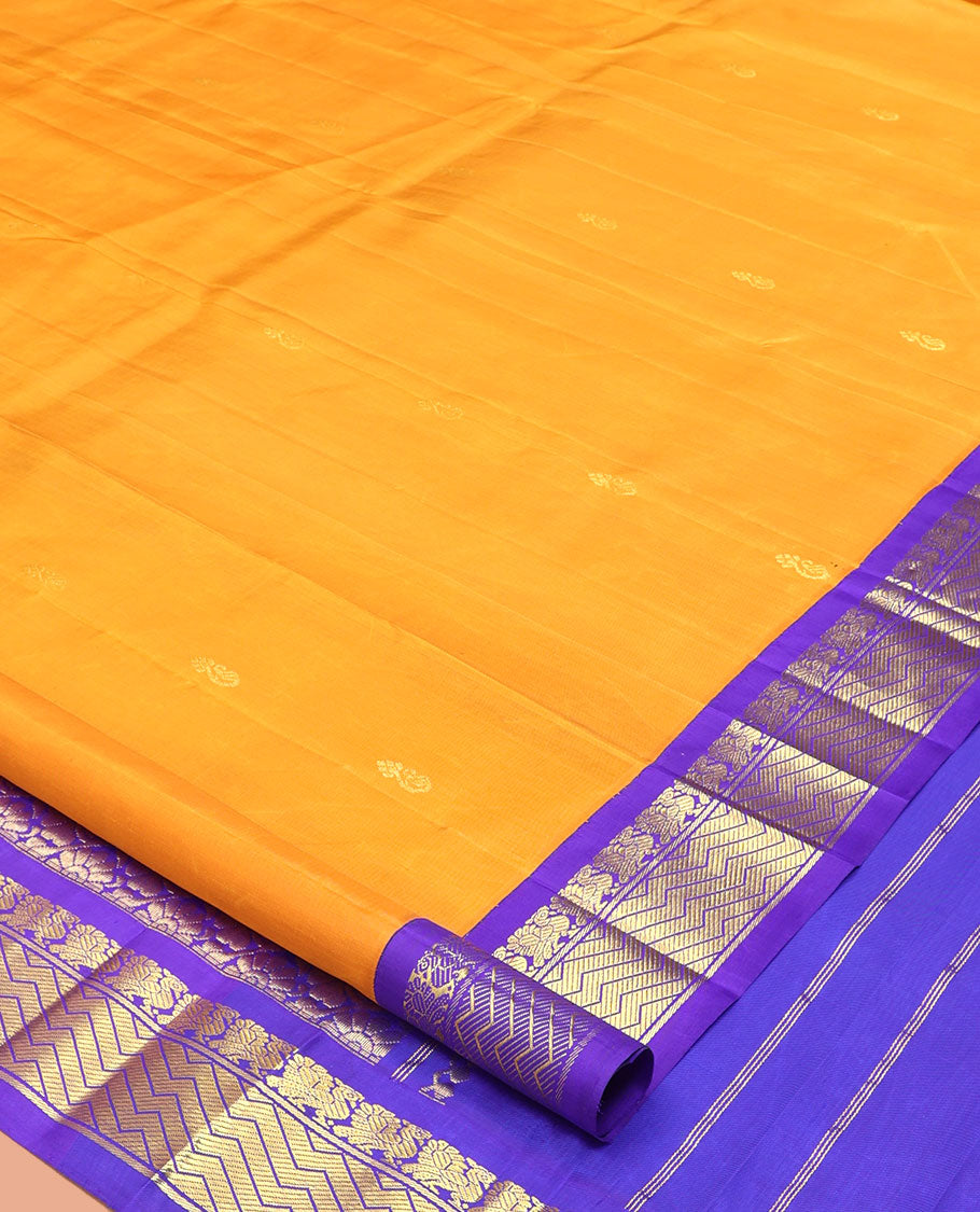 Yellow Kanchipuram Silk Saree, Subtly Sparkled with Zari Buttas, a Contrast One-Sided Korvai Border of Mayil Designs, a Floral Design Pallu, and No Blouse