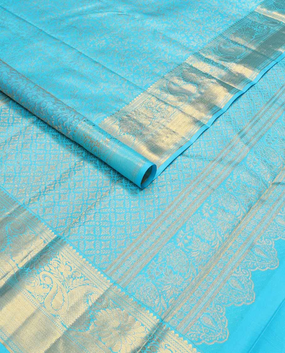 Blue floral jacqaurd silk saree with contrast design of thilakam mokku, banaras, manga design & floral pallu