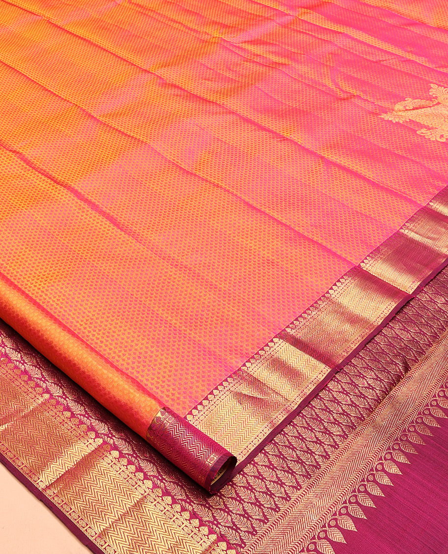 Orange Embossed Parambara Silk Saree, Adorned with Mayil Buttas, a Contrast Border of Thilakam Mokku, Poun, and Vanki Designs, Grand Pallu, and Contrast Blouse