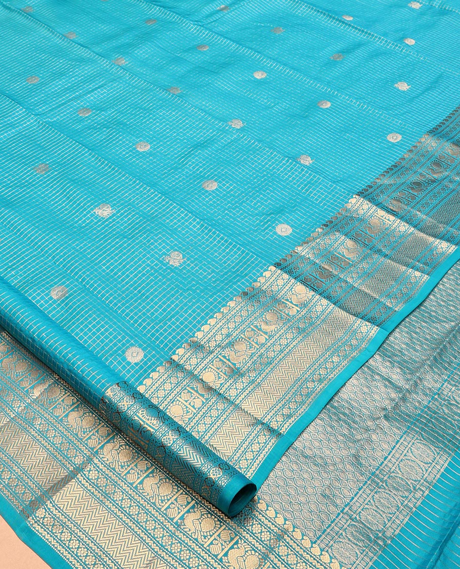 Blue Vasundhara Lite Silk Mix Saree, Richly Detailed with Zari Buttas and Zari Checks All Over Its Body, Highlighted by a Zari Border of Manga, Neli, Kamalam, Mayil, and Vanki Designs, Gleaming Intricately Designed Pallu, and Paired with a Matching Blouse