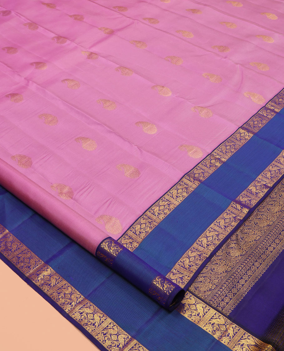 Pink Kanchipuram Silk Saree, Bedecked with Zari Buttas, a Contrast Korvai Rettai Pettu Border of Kili Designs, Butta Enclosed Checked Pallu, and a Contrast Blouse