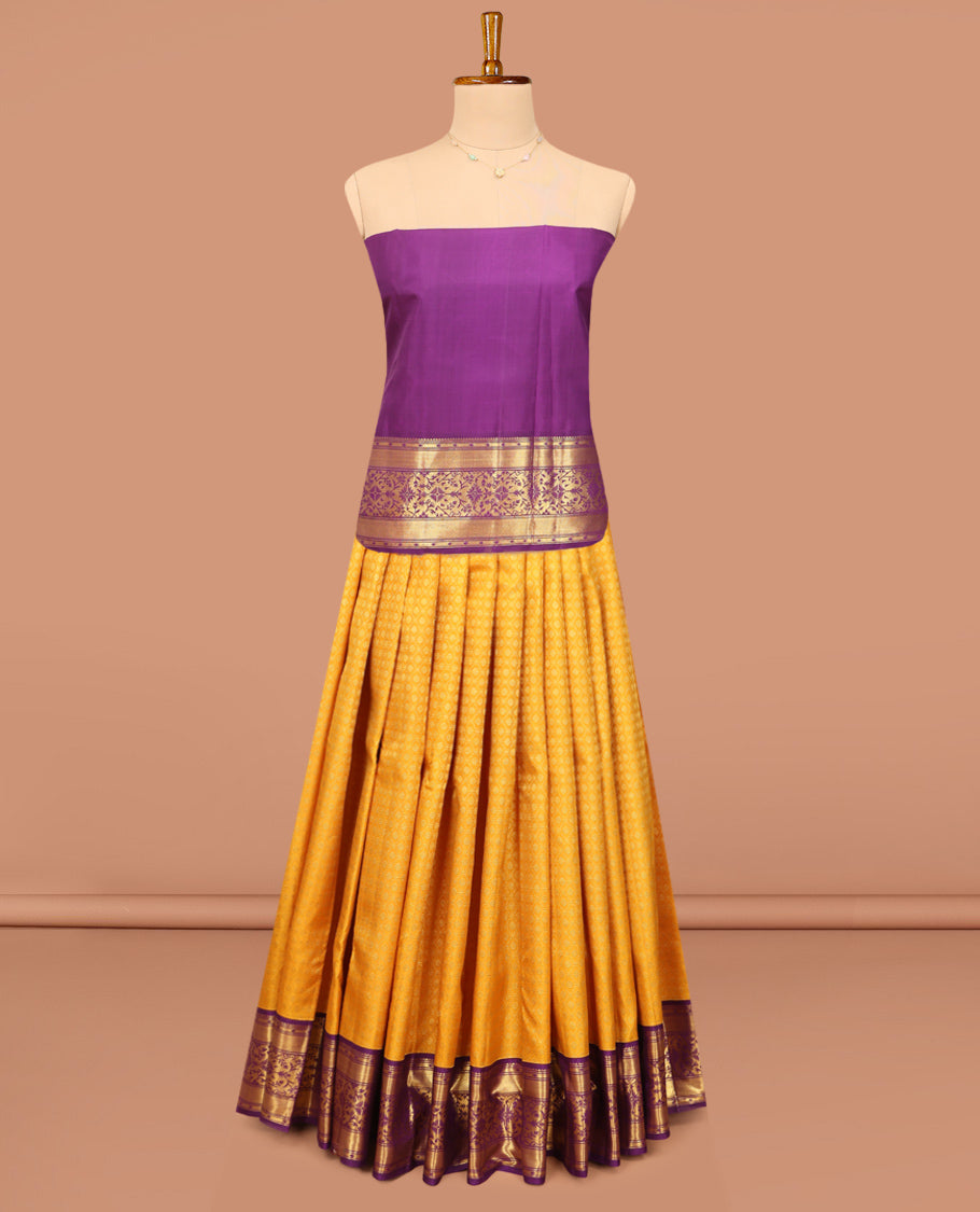 Yellow Pure Silk Half-Saree, Subtly Sparkled with Jacquard Design on Its Skirt, Complemented by a Contrast Zari Design Border, Comes with a Contrast Blouse and a Dhavani of Intricate Zari Weave