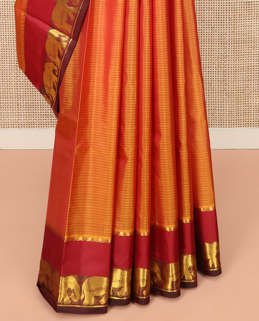 Orange Vazhaipoo Striped Kanchipuram Silk Saree, Complemented by Contrast Rettai Pettu Border of Thilakam Mokku, and Yaanai Designs, Pallu Subtly Woven in Stripes, and Paired with a Contrast Blouse